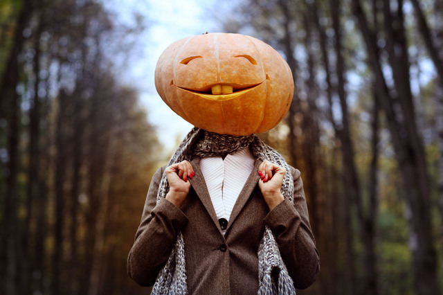 halloween girl with pumpkin head